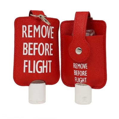Porte gel Remove Before Flight inlus gel désinfectant 50ml